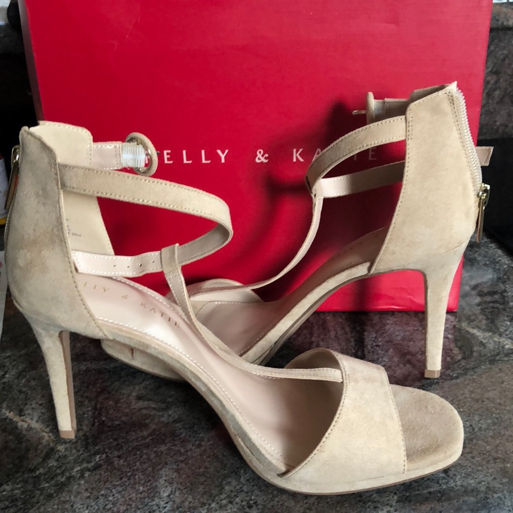 High heeled sandal.  New in box. Never worn